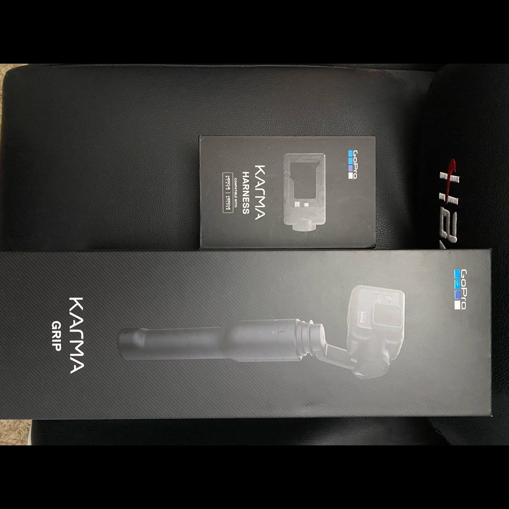 Selling my GoPro 4 silver AND Karma Grip and extra harness!